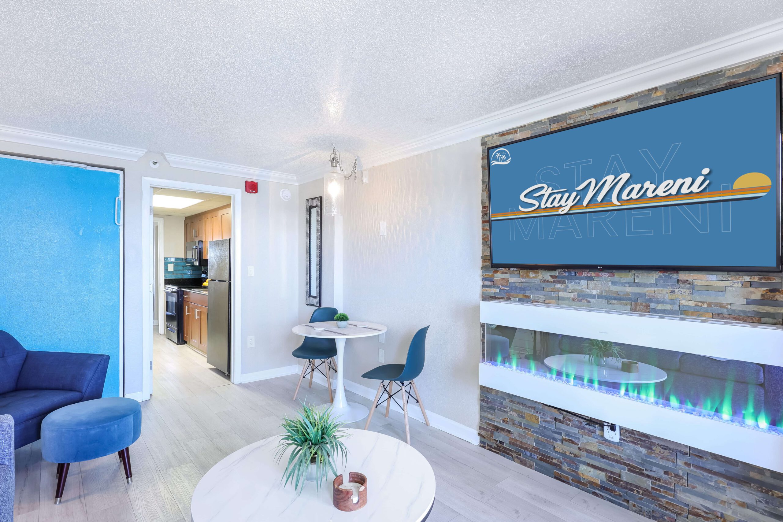 Oceanside Escape renovated living area with oceanfront balcony at StayMareni